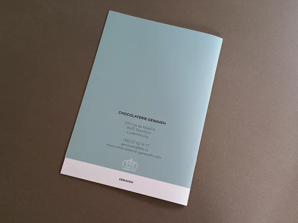 Le studio graphique e-conique conçoit le catalogue de Noël de la chocolaterie Genaveh